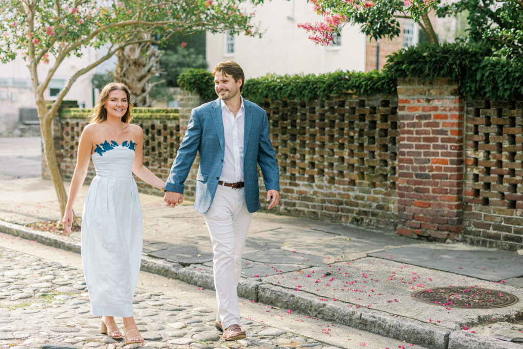 Cobblestone and brick with happy engaged couple
